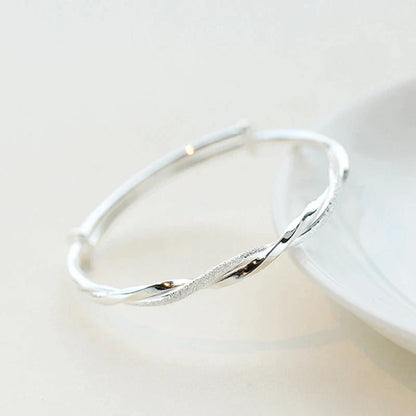Flätat Silverarmband