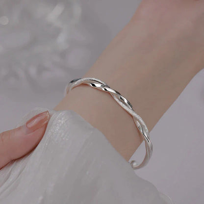 Flätat Silverarmband