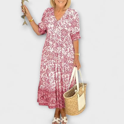 Caitlin - Graciös Blommig Klänning med en Luftig Design